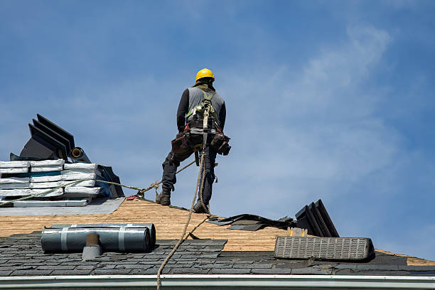Professional Roof Replacement technician working in Saint Clair, MO